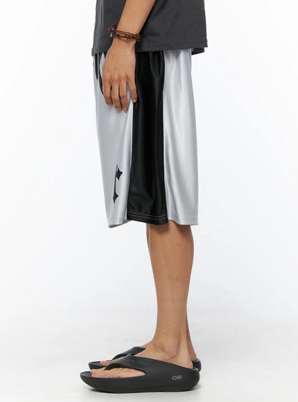 Men's Two-Tone Graphic Basketball Shorts IL520 Silver right side view on male model showing slim black side stripe panel contrast against silver mesh with cross detail