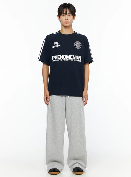 Men's Two-Tone Sweatpants IL528 Gray full front shot on male model standing straight styled with navy graphic tee wide-leg fit with white contrast side panels