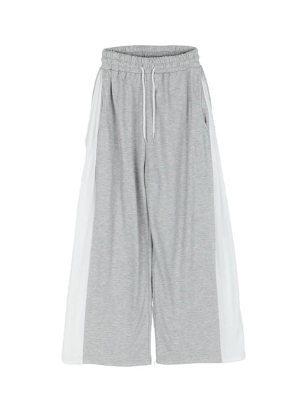 Men's Two-Tone Sweatpants IL528 Gray flat-lay front view showing elastic drawstring waistband wide white contrast side panels and relaxed wide-leg sweatpant cut