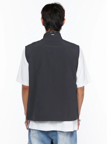 Men's Two-Way Anorak Vest IL515 Dark gray back shot on male model showing clean panel seam, drawcord neck detail, and lightweight nylon fabric