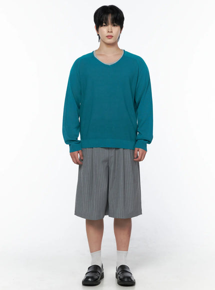 Men's V-Neck Knit Sweater IL502 Mint full-body front shot on model with hands at sides layered over grey inner tee with pinstripe shorts