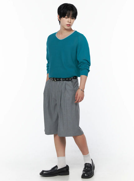 Men's V-Neck Knit Sweater IL502 Mint three-quarter side shot on model looking down showing knit texture V-neck and layered grey inner tee