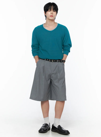 Men's V-Neck Knit Sweater IL502 Mint front shot on model hands in pockets relaxed pose showing cropped silhouette and ribbed hem detail