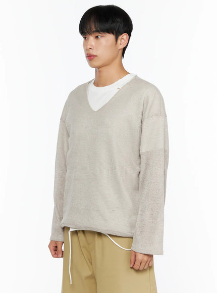 Men's V-Neck Summer Knit Top IL514 Beige side shot on model showing open-knit waffle texture, V-neckline, and oversized dropped-shoulder silhouette