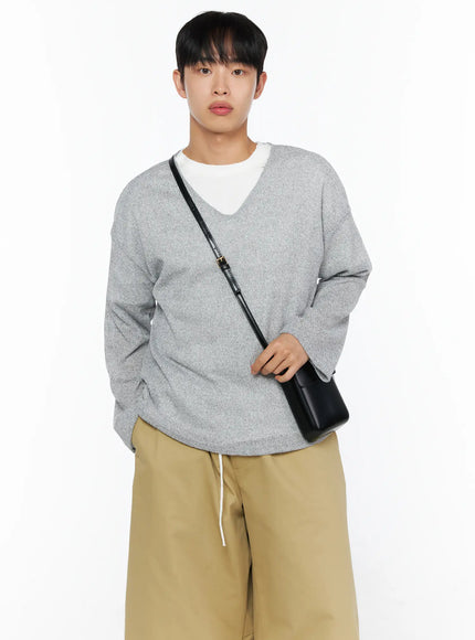 Men's V-Neck Summer Knit Top IL514 Gray cropped front shot on model with black crossbody bag layered over white tee and wide-leg khaki pants