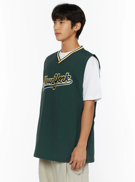 Men's Varsity Style Graphic Tank IL509 green side shot on male model showing angled view of New York graphic print and layered white tee underneath