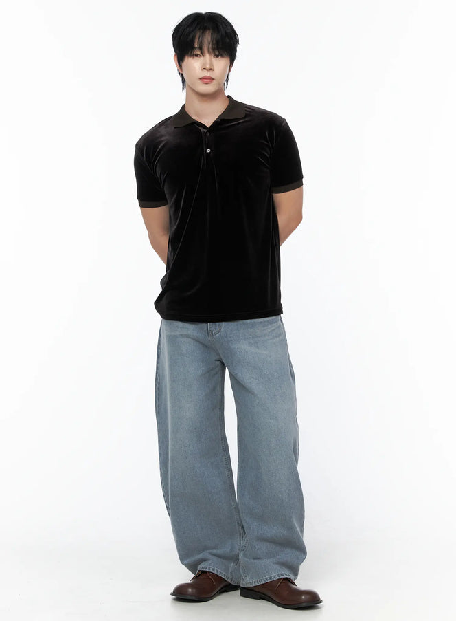 Men's Velvet Polo Shirt IL502 Black full-body front shot on model standing hands behind back styled with wide-leg jeans and brown loafers