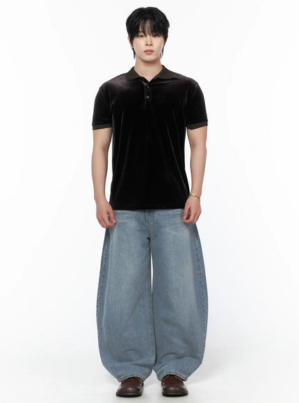 Men's Velvet Polo Shirt IL502 Black full-body front shot on model arms relaxed at sides styled with wide-leg light blue jeans and brown loafers