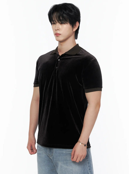 Men's Velvet Polo Shirt IL502 Black side shot on model angled view showing contrast dark olive collar and cuff trim velvet texture detail