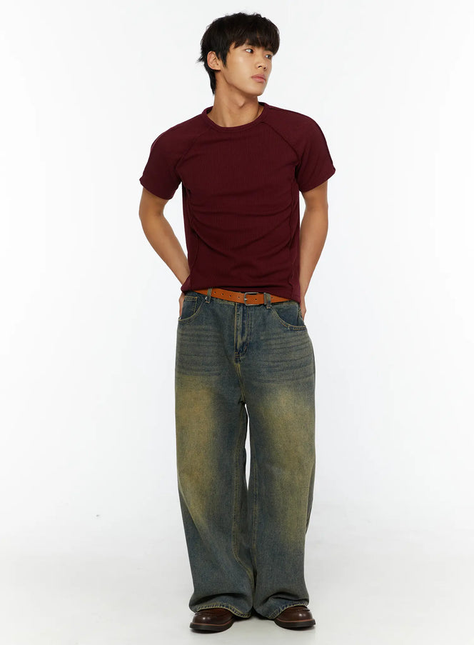 Men's Vintage Baggy Jeans IL510 Blue full-body front shot on male model standing, styled with burgundy ribbed tee and tan belt, extra-wide leg denim