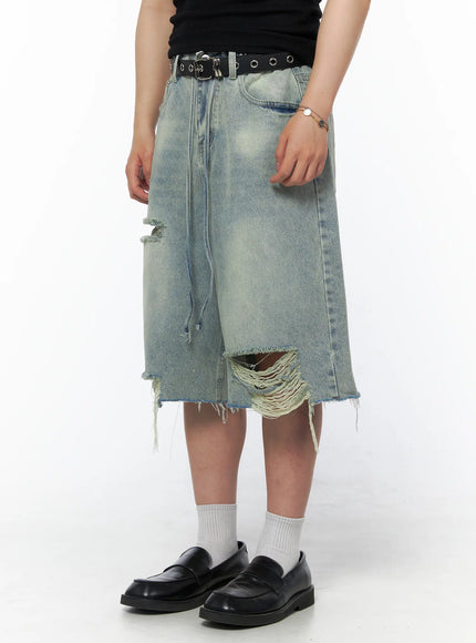 Men's Vintage Distressed Jorts IL502 Light blue side-angle view on model with distressed tears and frayed drawstring detail styled with black belt