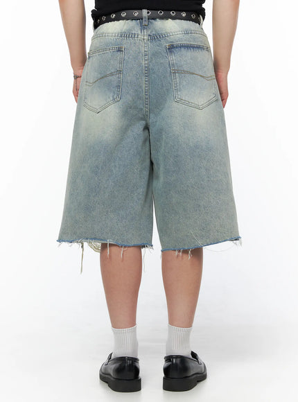 Men's Vintage Distressed Jorts IL502 Light blue back view on model showing dual back pockets acid wash texture frayed hem and raw cut edge detail
