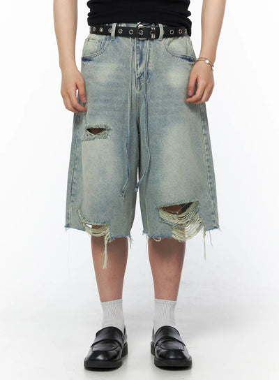 LEWKIN Men's Vintage Distressed Jorts IL502 Light blue front view on model wearing black belt and loafers showing ripped holes and frayed hem M/L