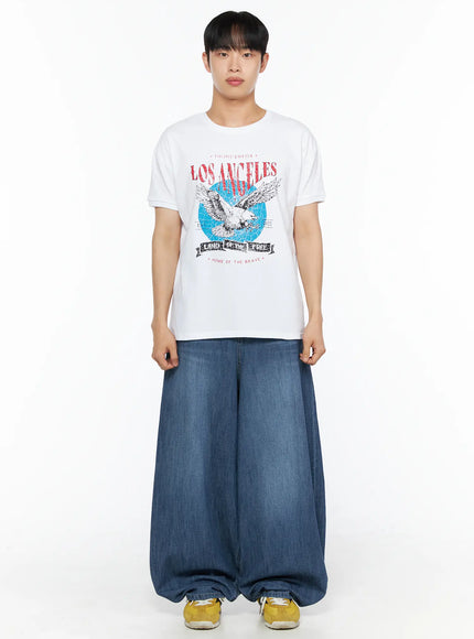 Men's Vintage Graphic Tee IL514 White full-body front view on male model styled with oversized wide-leg denim and yellow sneakers