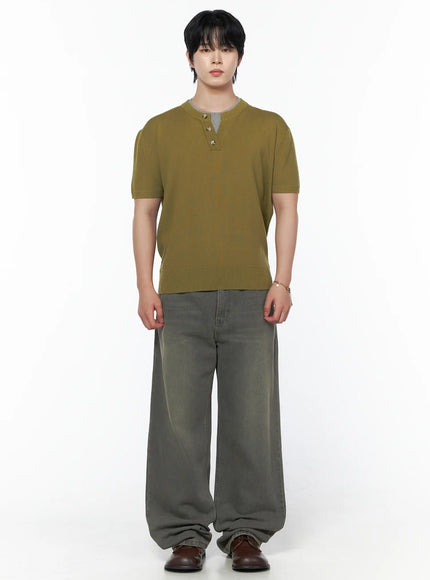Men's Vintage Semi-Wide Jeans IL502 Gray side shot on model showing back pocket detail, wide-leg cut, and faded wash denim stacking over brown leather shoes