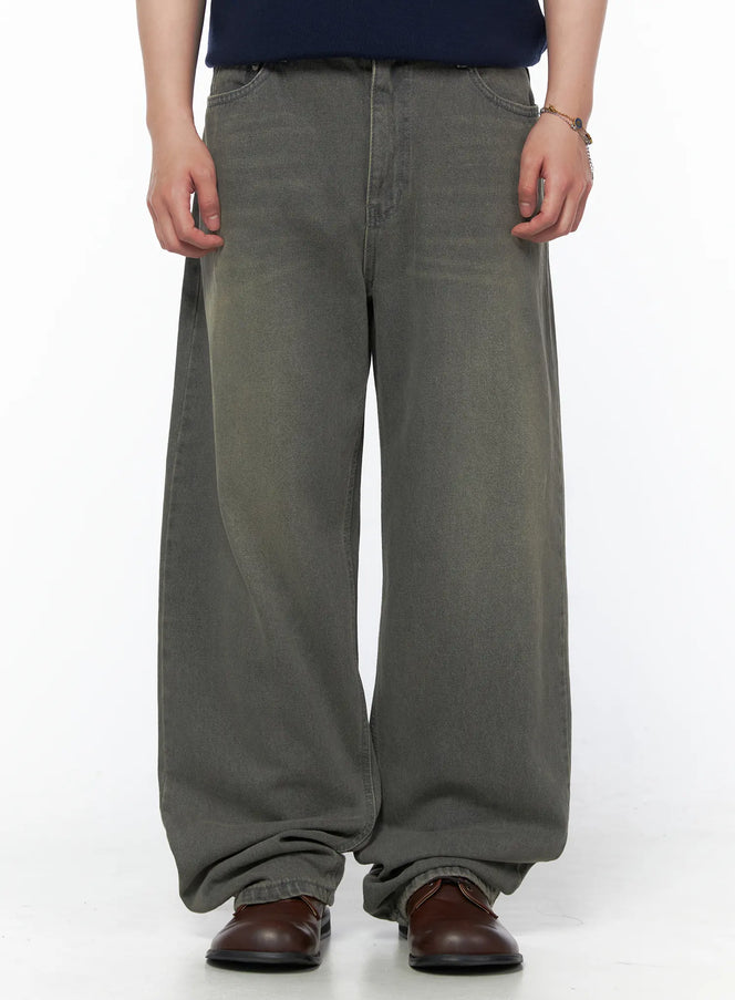 LEWKIN Men's Vintage Semi-Wide Jeans IL502 Gray front close-up on model showing oversized wide-leg denim with faded wash and stacked hem, styled with brown loafers
