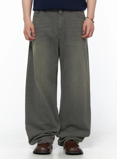 LEWKIN Men's Vintage Semi-Wide Jeans IL502 Gray front close-up on model showing oversized wide-leg denim with faded wash and stacked hem, styled with brown loafers