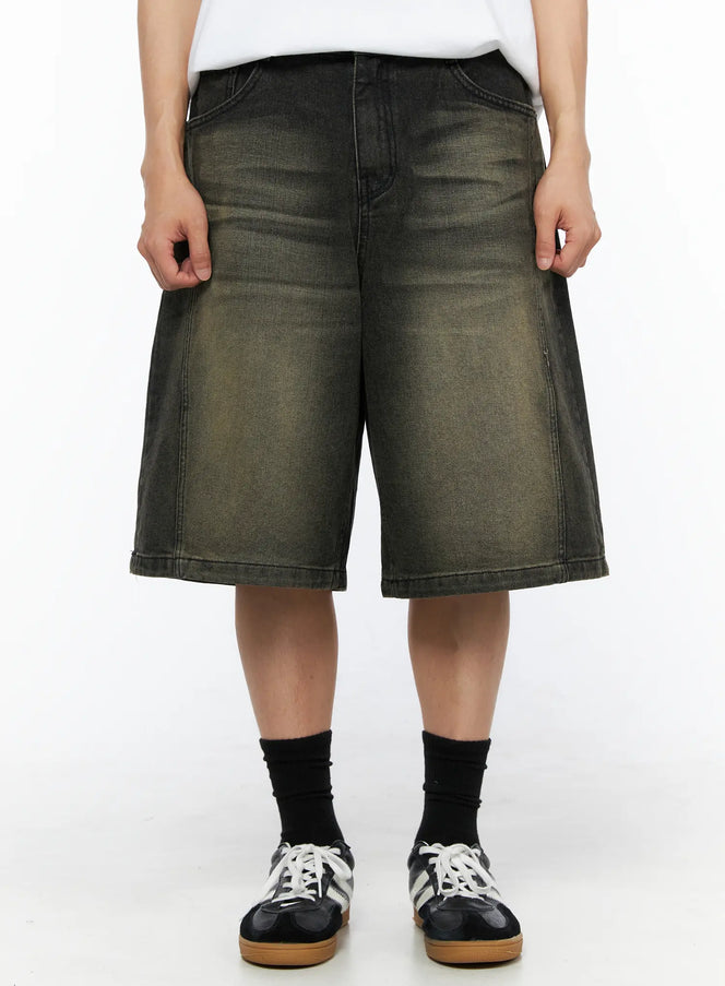 LEWKIN Men's Vintage Wash Jorts IL514 olive green front shot on model wearing white tee and sneakers, wide-leg washed denim shorts