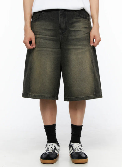 LEWKIN Men's Vintage Wash Jorts IL514 olive green front shot on model wearing white tee and sneakers, wide-leg washed denim shorts