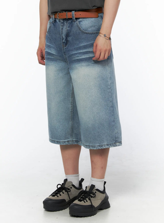 Men's Vintage Wash Jorts IU523 Light blue side-angle close-up on model showing faded wash texture, wide-leg silhouette, and side pocket detail