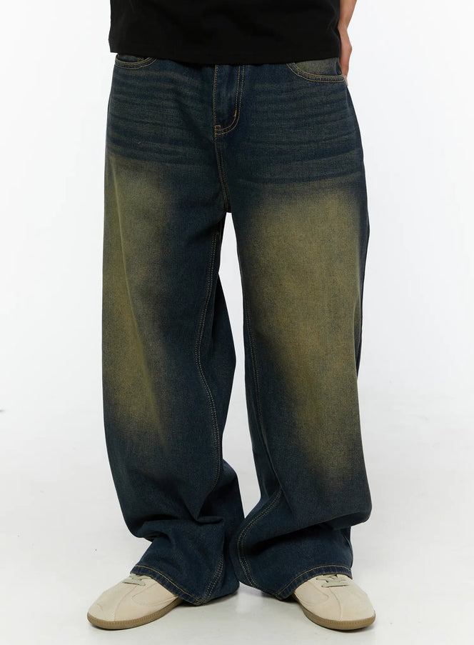 LEWKIN Men's Vintage Wide Leg Jeans IL510 indigo blue front shot on male model standing paired with black tee and beige sneakers, yellow-green wash fading denim