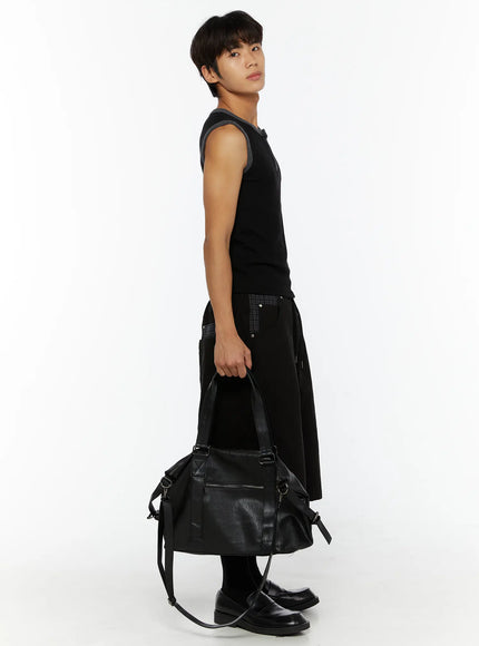 Men's Waffle Contrast Henley Tank IL507 Black side shot on model holding bag, gray contrast armhole trim, slim fit, styled with wide-leg trousers