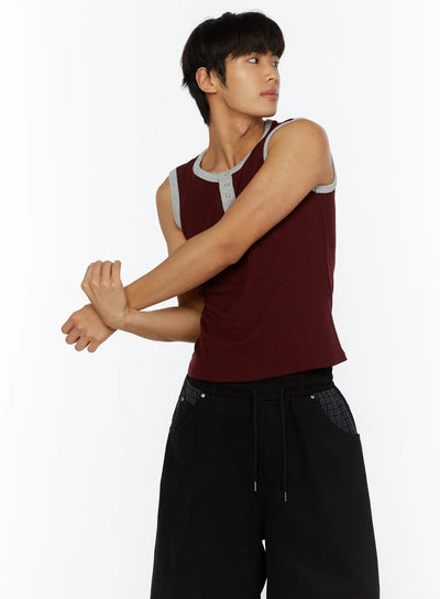 LEWKIN Men's Waffle Contrast Henley Tank IL507 Dark red S/M side shot on model with arms crossed, gray contrast trim, waffle knit texture