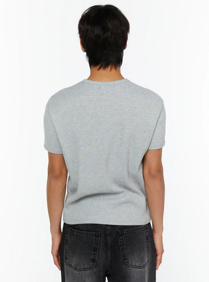 Men's Waffle Henley T-Shirt IL513 Gray back view on male model showing clean round neckline and waffle-knit fabric with dark wide-leg jeans