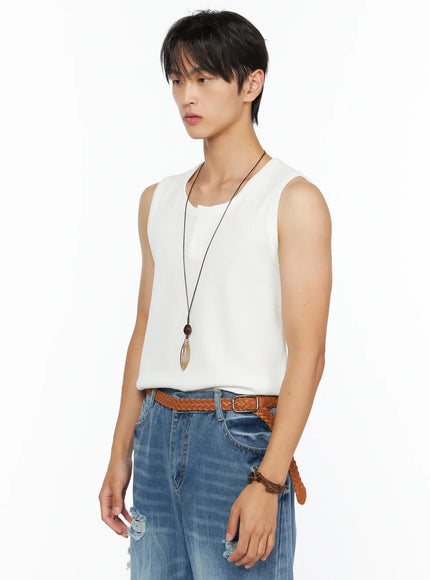 Men's Waffle Knit Henley Tank IL520 white side shot on male model turned slightly showing ribbed waffle texture neckline and layered necklace with ripped jeans waistband detail
