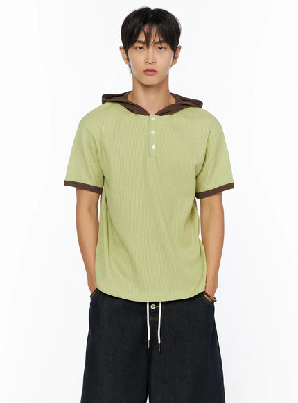 Men's Waffle Knit Hooded Henley Tee IL515 green front shot on male model cropped view showing waffle texture brown contrast hood and sleeve trim with henley buttons