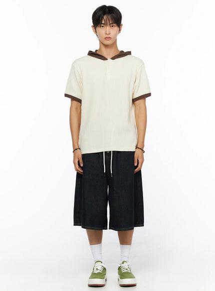 Men's Waffle Knit Hooded Henley Tee IL515 Light beige full-body front shot on male model standing straight styled with wide-leg dark denim shorts and green sneakers