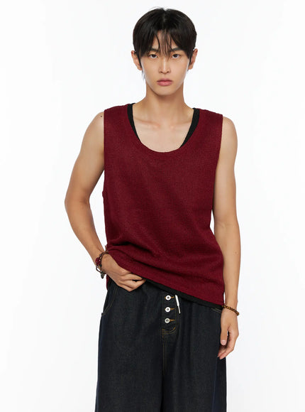 Men's Waffle Knit Layered Tank IL515 Red front cropped shot on model with hands at waist showing burgundy waffle knit body and black contrast U-neckline trim