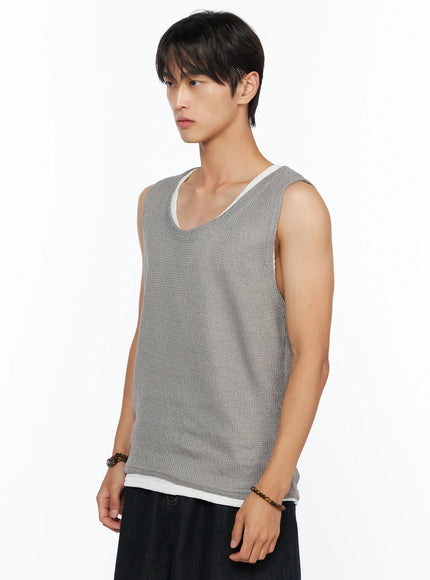 Men's Waffle Knit Layered Tank IL515 Gray side shot on model cropped at waist highlighting open armhole waffle knit fabric and layered white hem detail