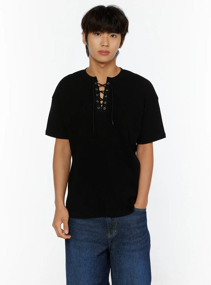 Men's Waffle Short Sleeve Tee IL515 Black M/L front shot on male model wearing with blue denim jeans, lace-up eyelet neckline visible
