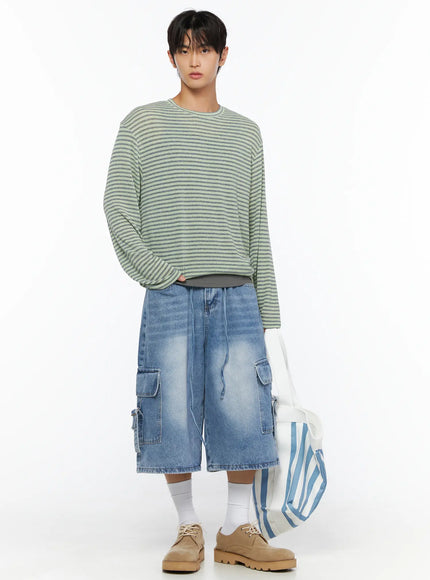 Men's Washed Cargo Jorts IL515 Light blue full-body front shot on male model styled with striped green knit top and striped tote bag