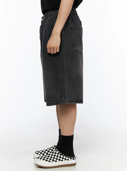Men's Washed Pintuck Jorts IL514 Black side shot on model showing back patch pocket, elastic waistband, and washed denim fabric detail