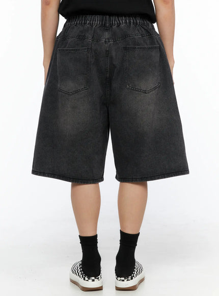 Men's Washed Pintuck Jorts IL514 Black back shot on model showing dual patch pockets, elastic waistband, and acid-washed wide-leg denim