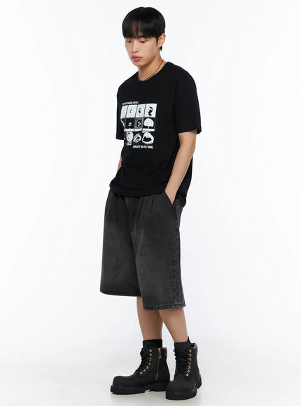 Men's Washed Pintuck Jorts IL514 Black side-angle full-body shot on model styled with black graphic tee and combat boots, wide-leg silhouette