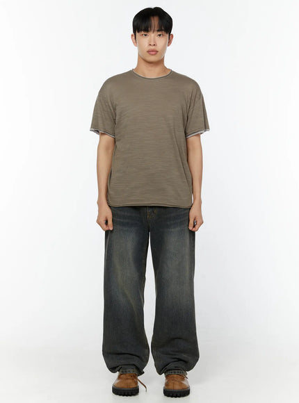 Men's Washed Wide Leg Jeans IU529 Dark blue full-body front shot on model in khaki slub crewneck tee and brown boots, arms relaxed at sides