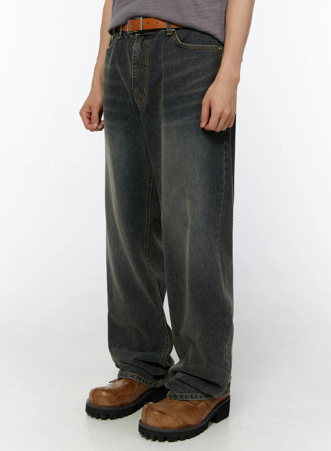 Men's Washed Wide Leg Jeans IU529 Dark blue side crop shot on model showing wide-leg silhouette with brown belt and chunky boots