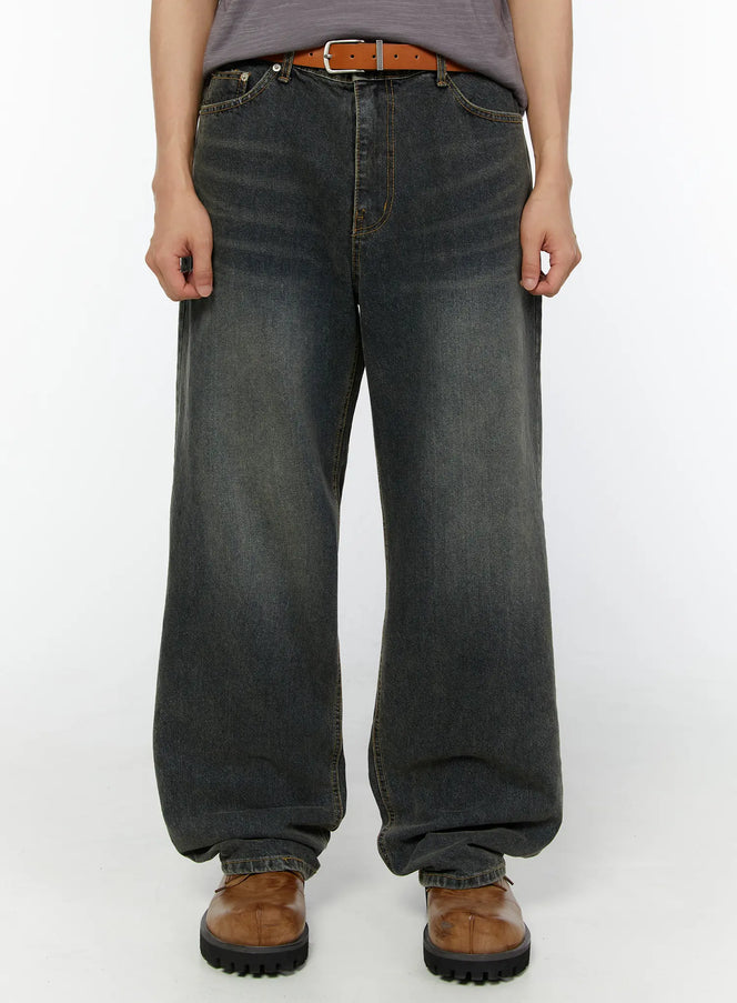 LEWKIN Men's Washed Wide Leg Jeans IU529 Dark blue front crop shot on model wearing brown leather belt and boots, faded denim texture
