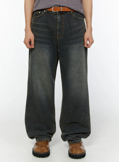 LEWKIN Men's Washed Wide Leg Jeans IU529 Dark blue front crop shot on model wearing brown leather belt and boots, faded denim texture