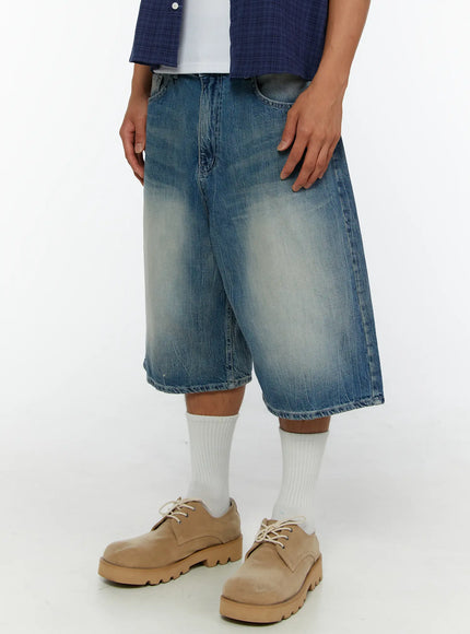 Men's Washed Wide Leg Jorts IL513 Blue side close-up on model highlighting wide leg cut, vintage wash, and inseam stitching detail styled with beige lace-up shoes