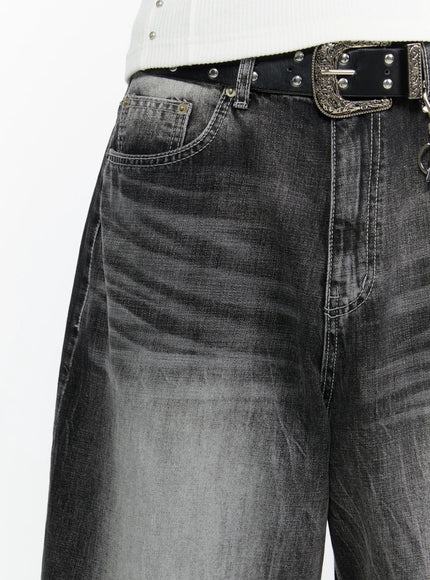 Men's Washed Wide Leg Jorts IL515 Black close-up detail shot of waistband showing washed denim texture, coin pocket, and ornate silver western belt buckle