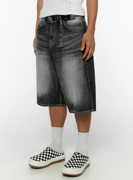 Men's Washed Wide Leg Jorts IL515 Black angled front crop shot on model showing silver chain charm at waistband and washed denim detail