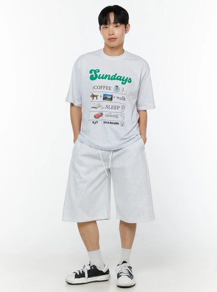 Men's Wide Leg Bermuda Sweat Shorts (Light Gray) IU529 Light Gray full-body front view on male model styled with graphic tee and sneakers, standing pose