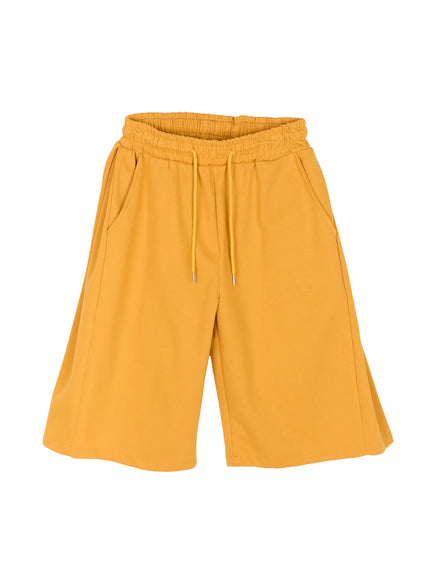 Men's Wide Leg Bermuda Sweat Shorts (Yellow) IU529 yellow flat-lay front showing elastic ruched waistband, yellow drawstring with metal tips and wide-leg bermuda cut