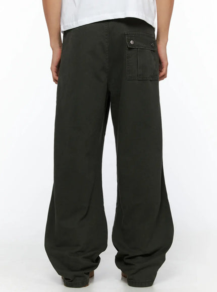 Men's Wide Leg Cargo Pants IL528 dark olive back view on model showing snap-button flap back pocket and wide-leg cotton twill construction