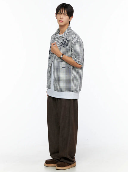 Men's Wide Leg Cotton Pants IL528 Dark brown full-body side shot on male model styled with plaid overshirt layered over white tee