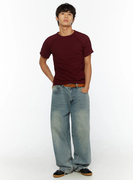 Men's Wide Leg Jeans IL510 light blue full-body front shot on male model styled with burgundy ribbed tee brown belt and black sneakers